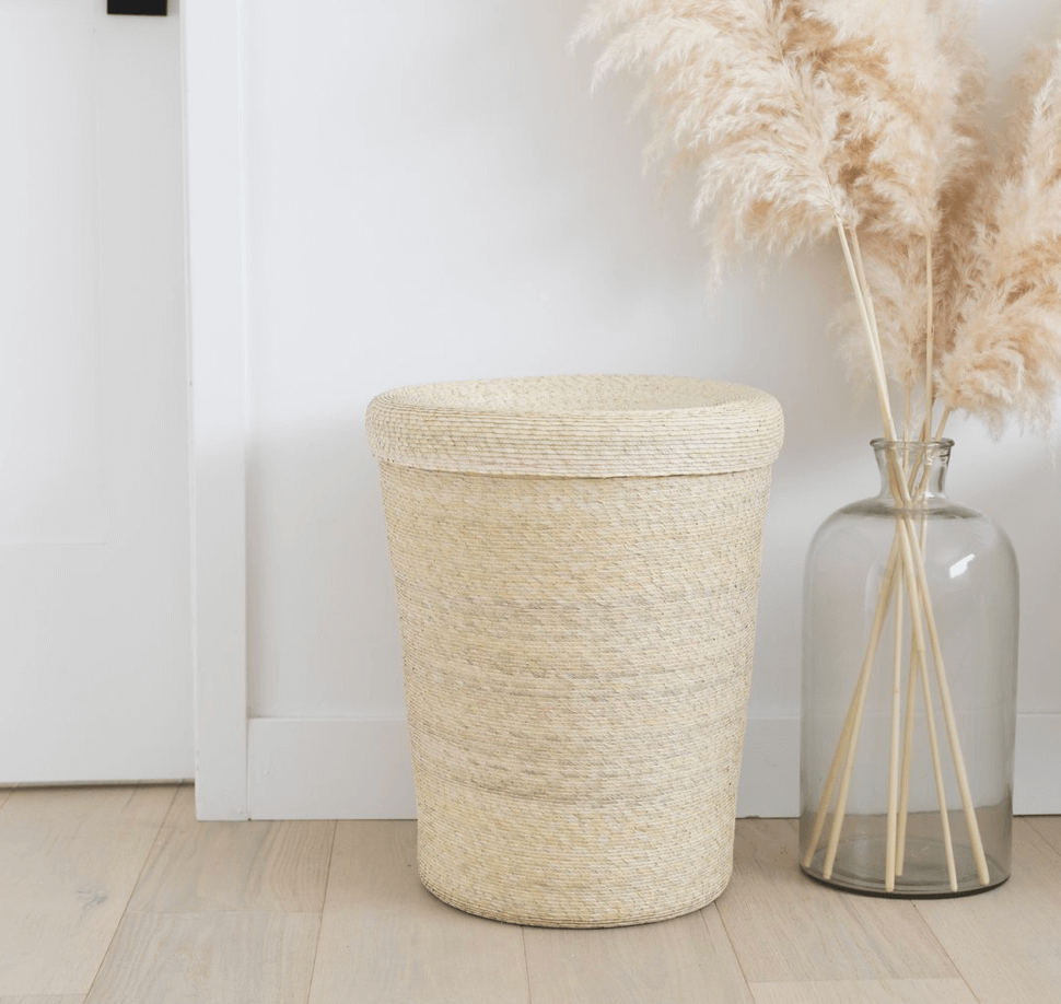 Create a healthy home with the Makaua palm fiber hamper, whose creation employs local Mexican artisans to weave by hand from natural palm fibers.